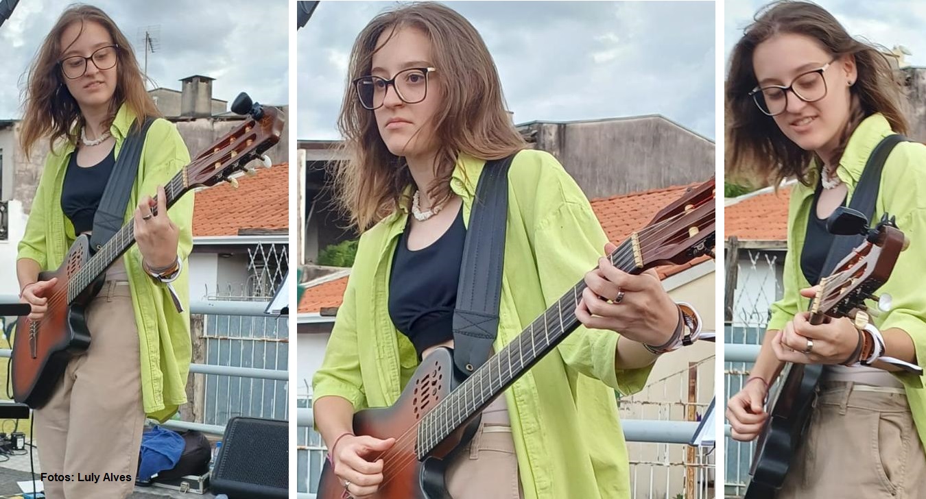 Menina tocando guitarra
