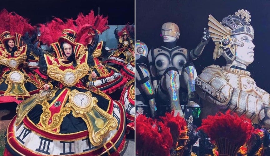 Pessoas com fantasias durante desfile de carnaval Pessoas com fantasias durante desfile de carnaval