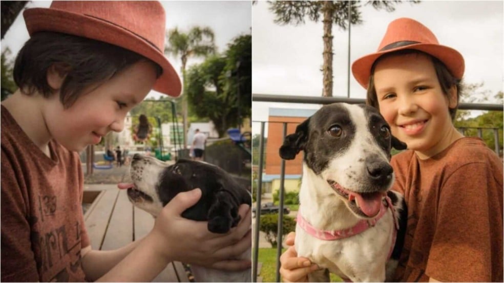 Menino abraçando cachorro