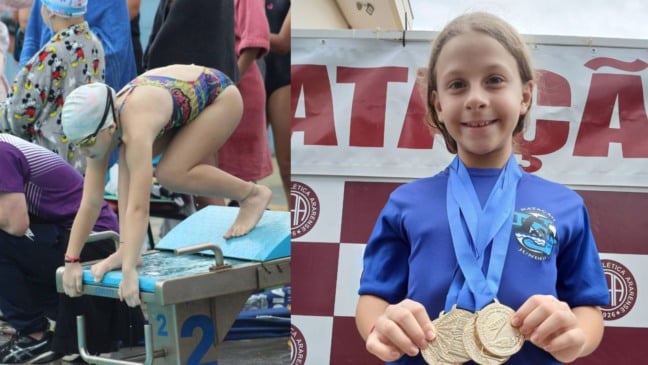 Catarina com suas medalhas. Catarina com suas medalhas.
