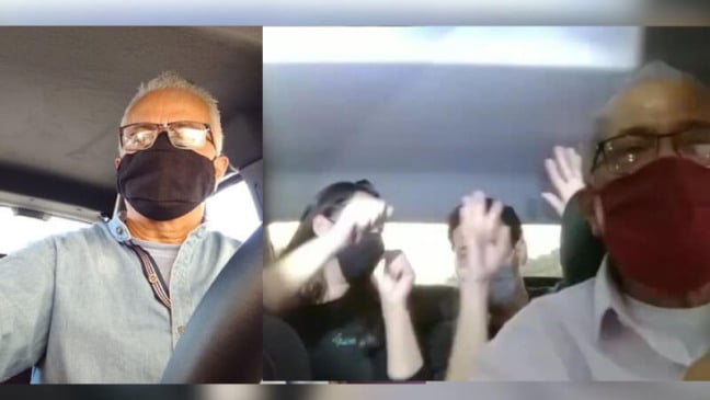 Motorista com passageiros no banco de trás