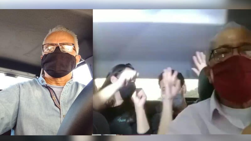 Motorista com passageiros no banco de trás