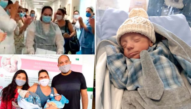 Família com gêmeos no colo