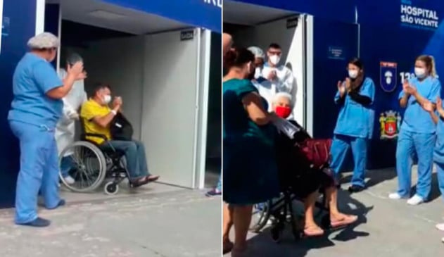 Homem e mulher saindo de cadeira de rodas do Hospital de Campanha