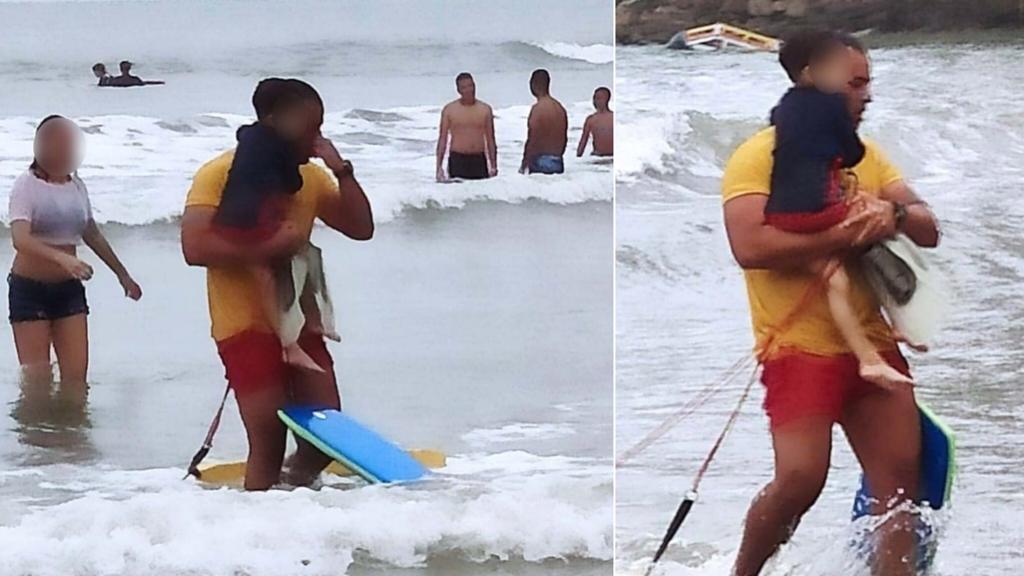 Bombeiro tirando criança de Jundiaí do mar do Guarujá