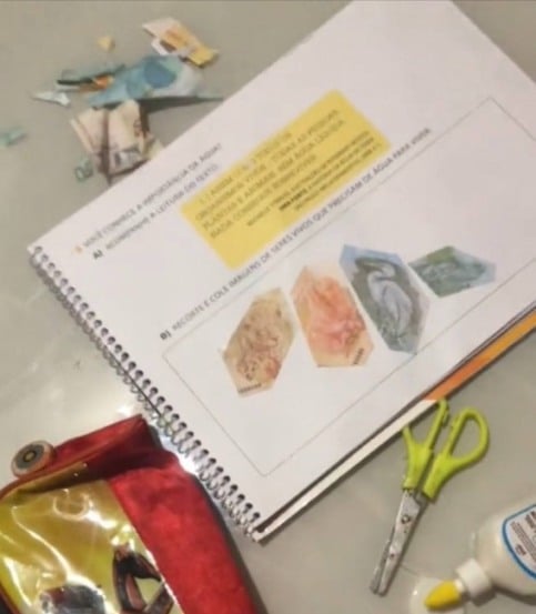 criança-recorta-cédulas-de-dinheiro-compressed