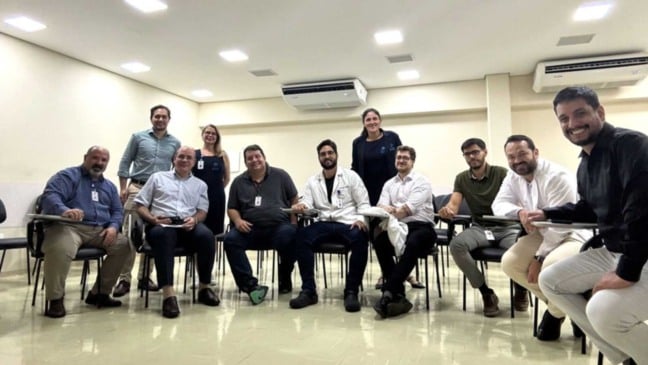 Profissionais de saúde em evento.