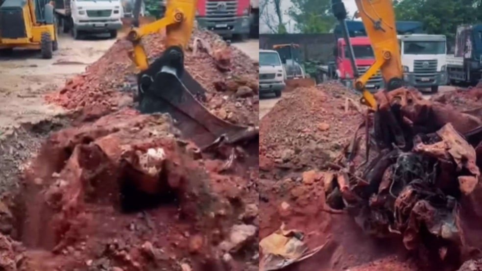 Carro sendo desenterrado.