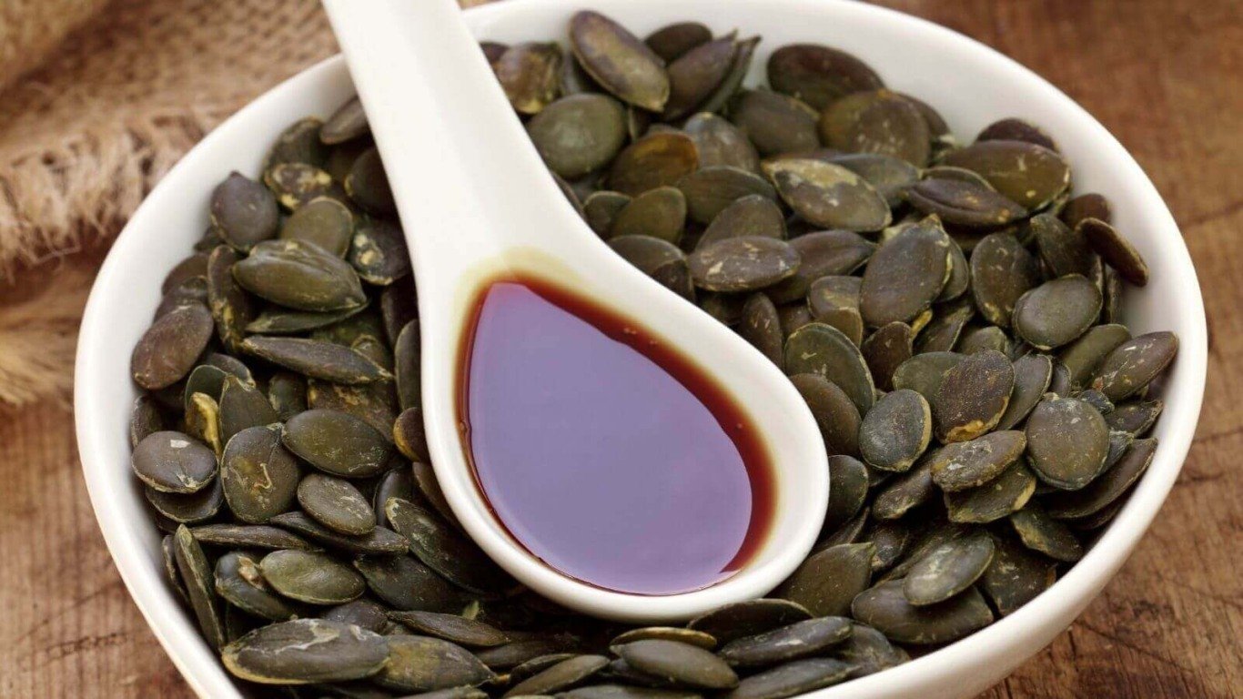 Pote de sementes e com óleo de semente de abóbora