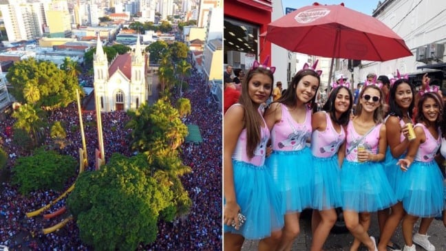 imagem de drone mostra multidão em edição passada do Refogado do Sandi. Ao lado, garotas de uma ala, fantasiadas com saia, tiaras e um guarda-chuvas