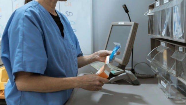 Farmacêutica em sua atuação.