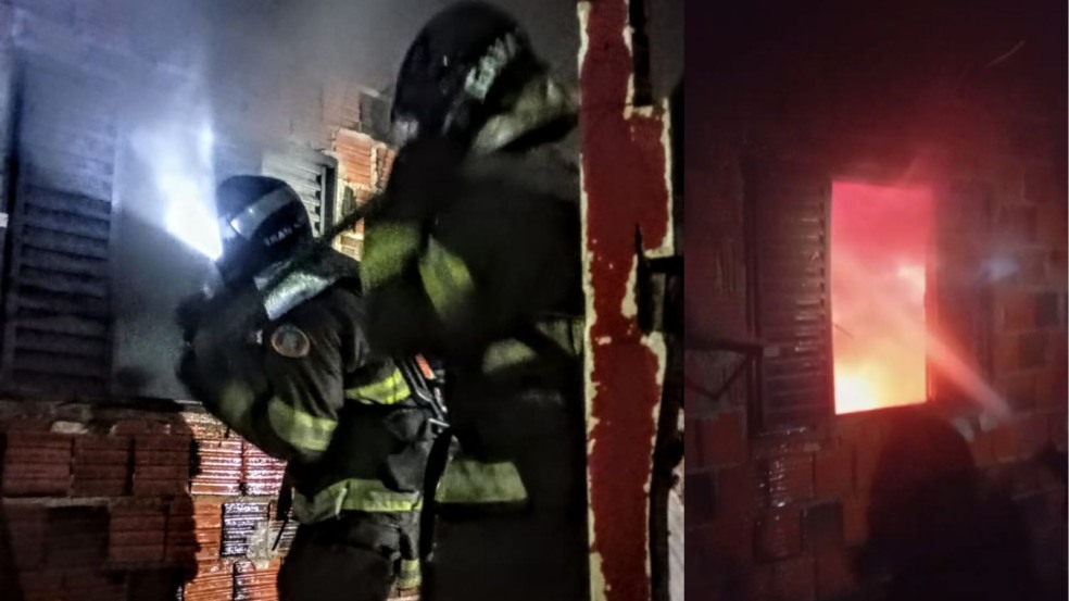 Casa em chamas e ação dos bombeiros.