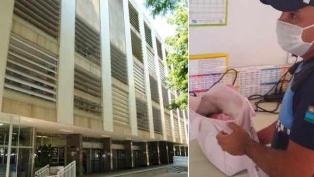 Foto do Fórum de Jundiaí ao lado do guarda que encontrou a recém-nascida, com ela nos braços