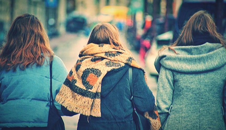 Três mulheres agasalhadas