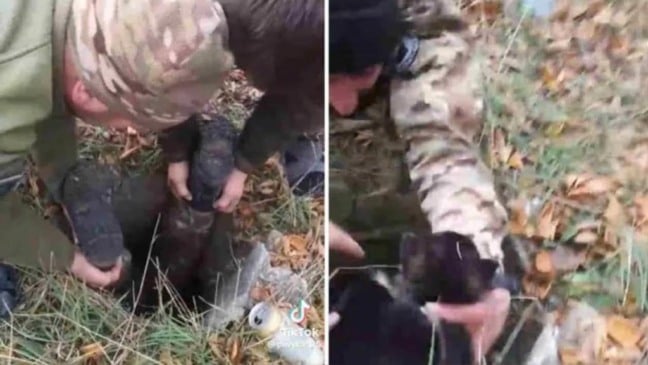 Soldados salvando cachorro de poço na Ucrânia