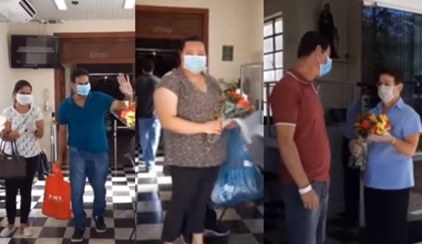 Foto de pacientes deixando o hospital, com flores e carinho de profissionais do HSV