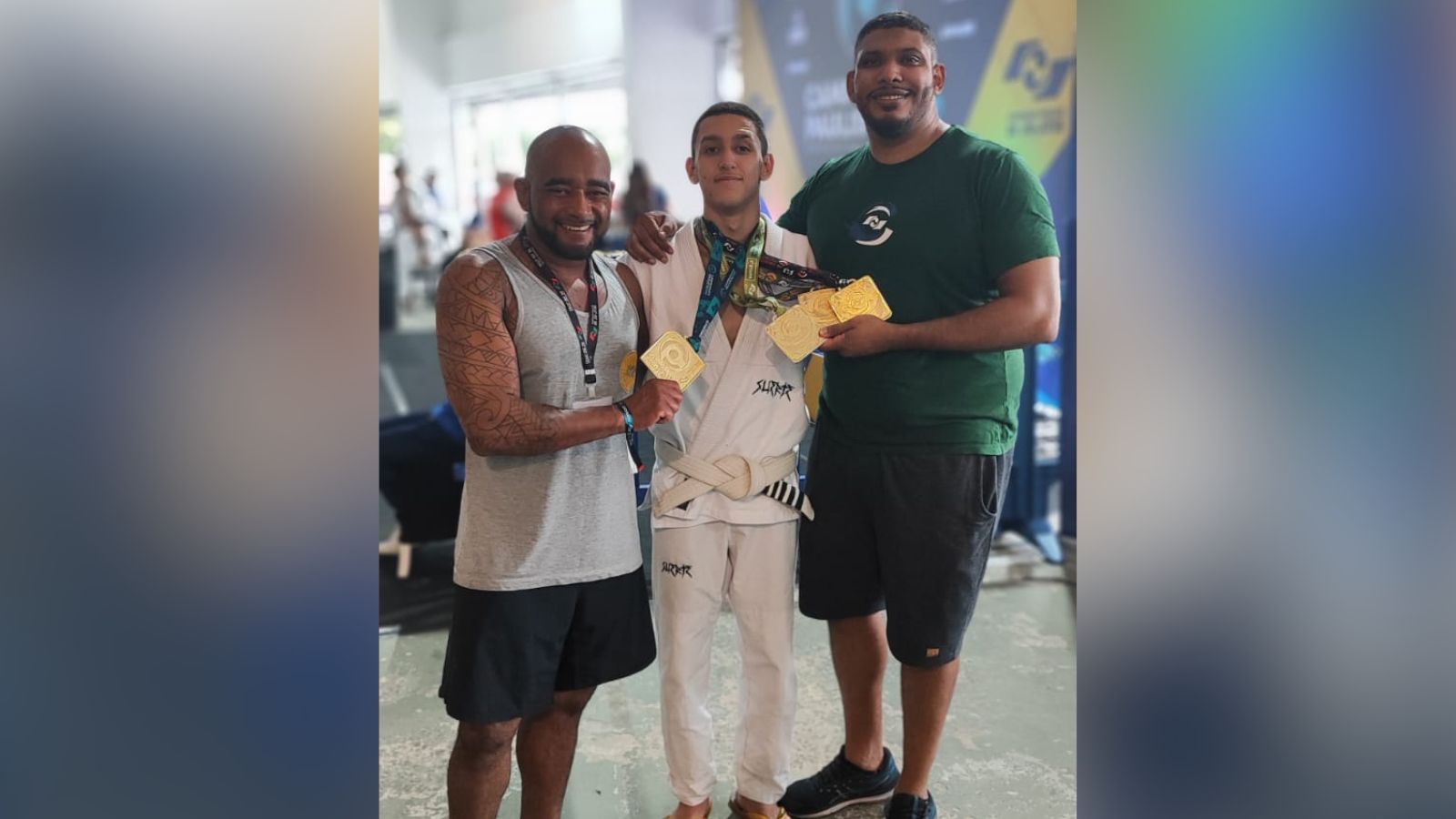 Murilo "Caramelo", atleta de Jiu Jitsu e seus professores