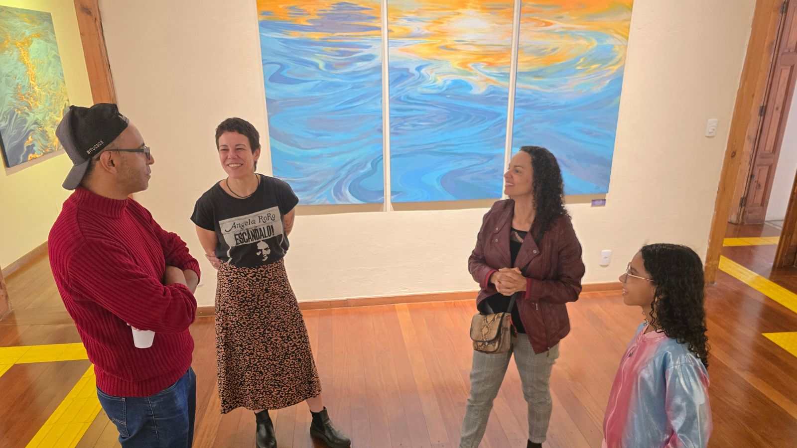 Emília Santos e visitantes