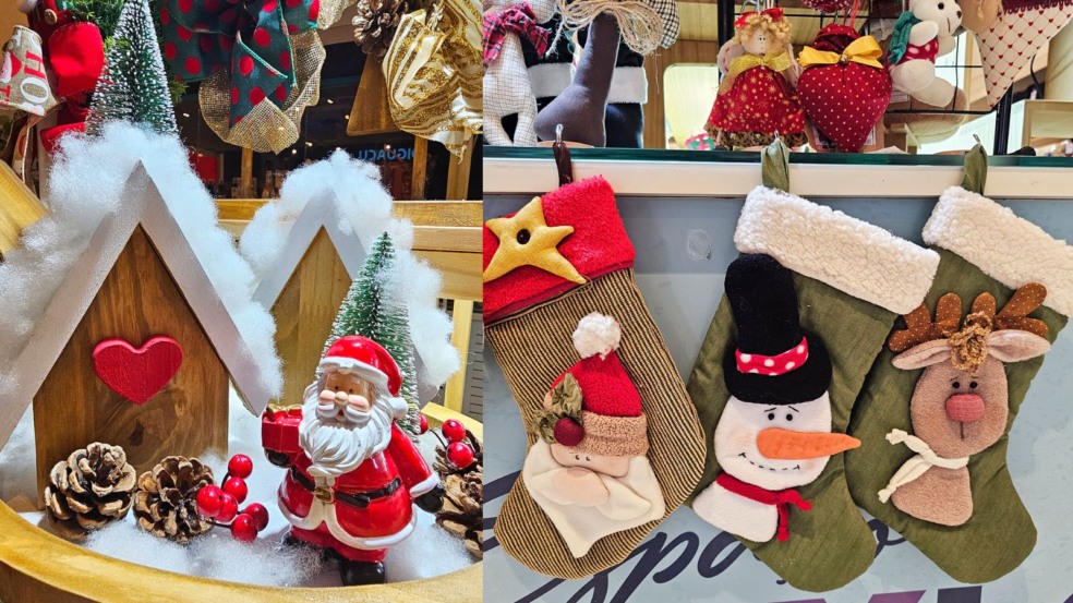 Artesanatos natalinos expostos: casinhas de madeira com neve artificial, mini Papai Noel, pinhas, e meias de tecido decoradas com Papai Noel, boneco de neve e rena, exibidas em feira temática. Artesanatos natalinos expostos: casinhas de madeira com neve artificial, mini Papai Noel, pinhas, e meias de tecido decoradas com Papai Noel, boneco de neve e rena, exibidas em feira temática.